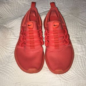 Red slip on Nike sneakers